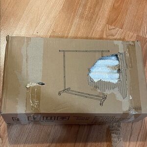 Clothing rack white metal in box